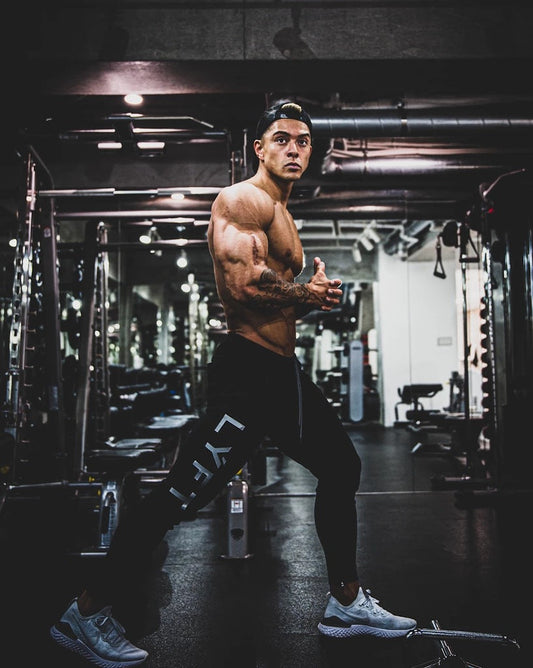 calça masculina de esportes estilo fino com bolsos