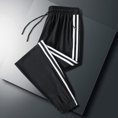calça larga masculina com alça pra amarrar e listra do lado