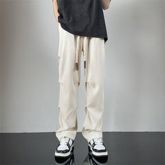 calça larga e reta estilo streetwear com bolsos e laço pra amarrar