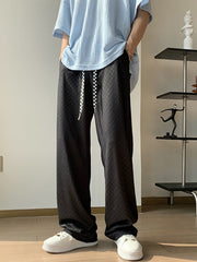 calça reta xadrez com laço