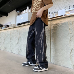 calça jeans larga com detalhes