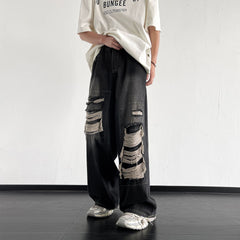 calça jeans larga com rasgos e remendas estilo streetwear