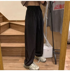 calça fina masculina com perna larga high street