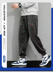 Calças masculinas de veludo 2023 casuais outono e inverno jovens soltas com cordão vigas harém