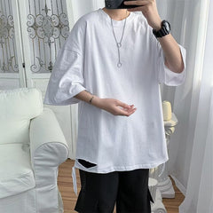 camisa masculina larga estilo streetwear com borda rasgada