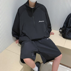 conjunto de corta vento e shorts espressura fina