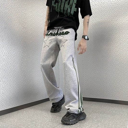 calça reta esportiva com letras high street