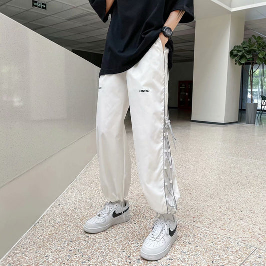 calça masculina estilo high street larga com faixas do lado a prova da agua
