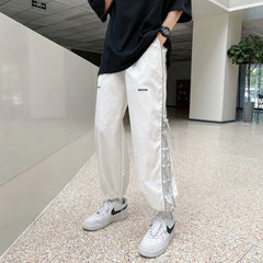 calça masculina estilo high street larga com faixas do lado a prova da agua