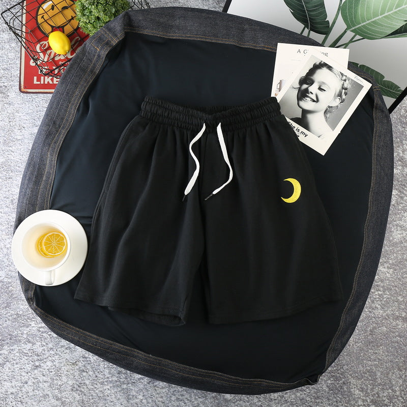 shorts casuais com nuvens e sol estamapado