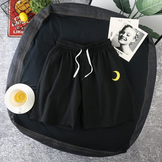 shorts casuais com nuvens e sol estamapado