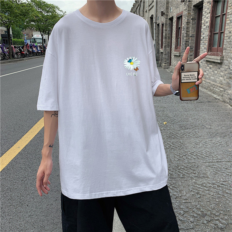 camiseta masculina solta com margarida estampada