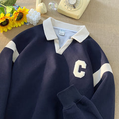 sueter polo estilo streetwear com gola e ''C'' bordado