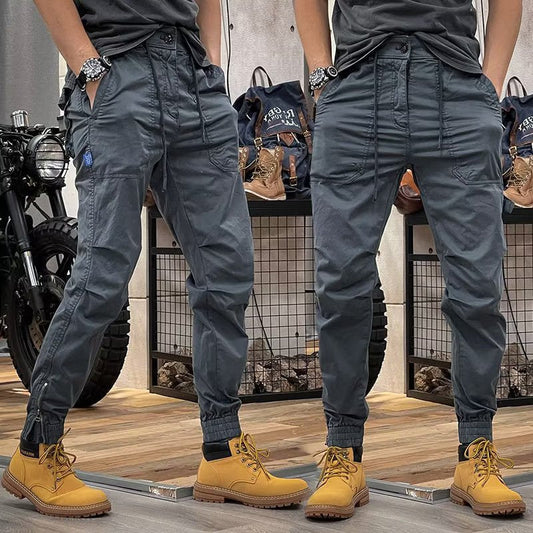 calça estilo cargo de cintura elástica com vários bolsos solto