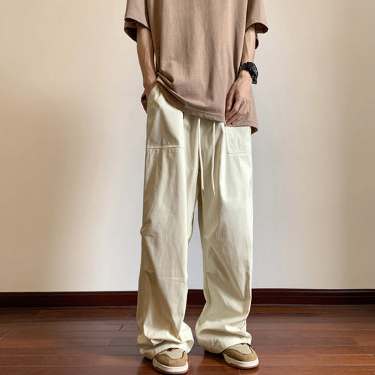 calça reta e larga com bolso e laço