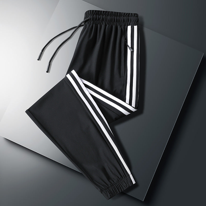 calça larga masculina com alça pra amarrar e listra do lado