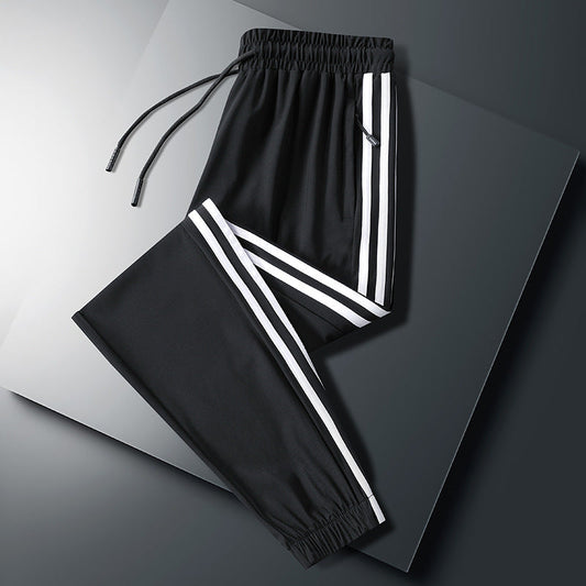 calça larga masculina com alça pra amarrar e listra do lado