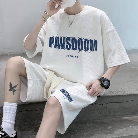 conjunto de camisa com letra bordada e shorts largo com laço