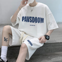 conjunto de camisa com letra bordada e shorts largo com laço