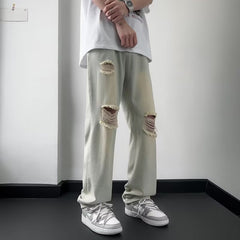 calça jeans masculina com joelhos rasgados