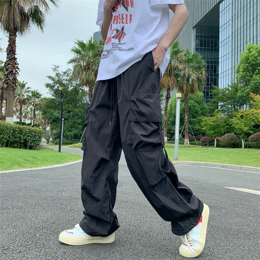 calça cargo modelo fina com bolsos e alça pra amarrar