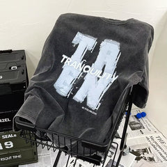 Blusa masculina de meia manga estampada e lavada de rua, tendência de verão masculina, com fundo solto, marca maré, gola redonda, algodão puro