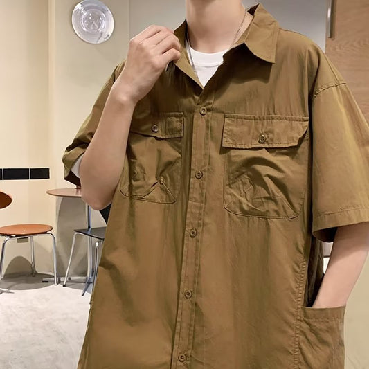 Camisa de ferramentas de manga curta da marca da moda de verão masculina versão coreana solta Oxford casual camisa de meia manga
