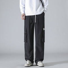 calça larga com multi bolsos estilo high street