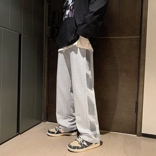 Calça de pernas largas masculinas