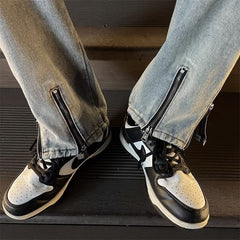 Calça jeans masculina com zíper nas ponta das calças