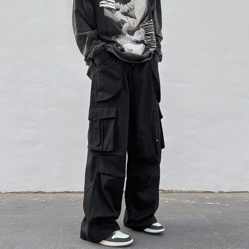calça cargo larga estilo streetwear hip hop com multiplos bolsos