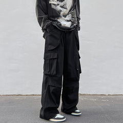 calça cargo larga estilo streetwear hip hop com multiplos bolsos