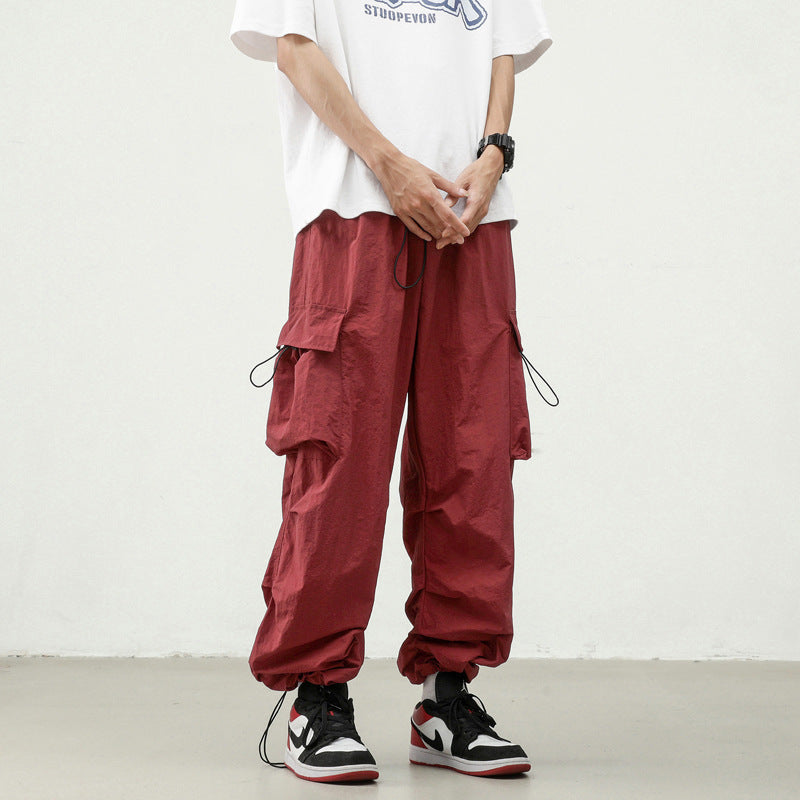 calça cargo com multiplos bolsos modelo fino