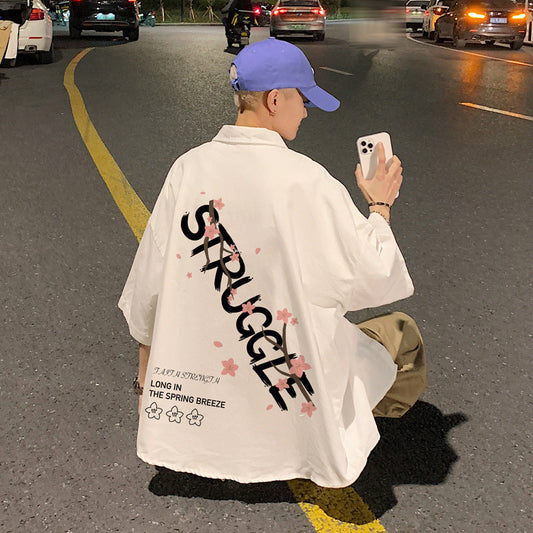 camiseta de manga curta larga estilo streetwear com estampa nas costas