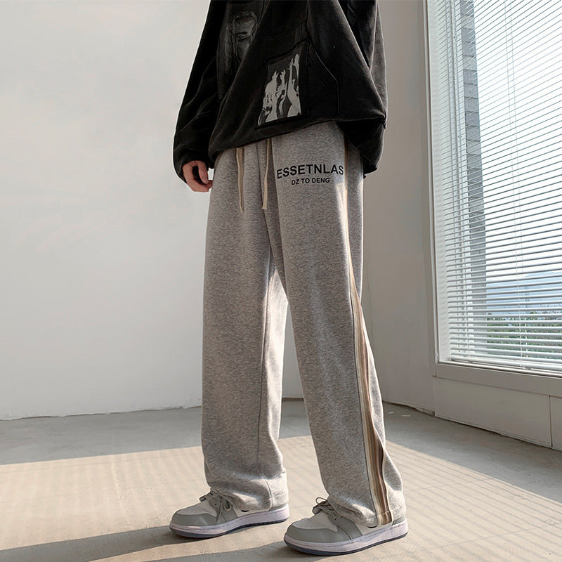 calça larga estilo americano com listra reta com cordão pra amarrar