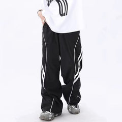 calça larga corta vento estilo streetwear