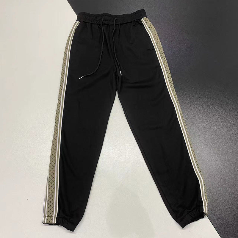 calça de moletom masculina com listra do lado high street