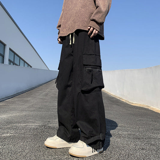calça cargo de perna larga e alça pra amarrar estilo streetwear