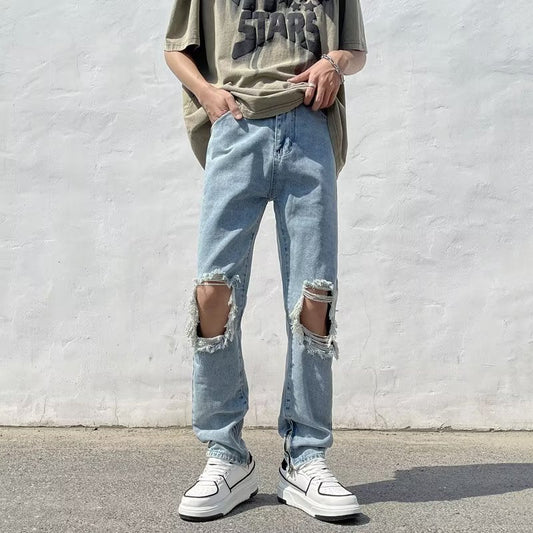calça jeans masculina estilo streetwear com joelhos rasgados